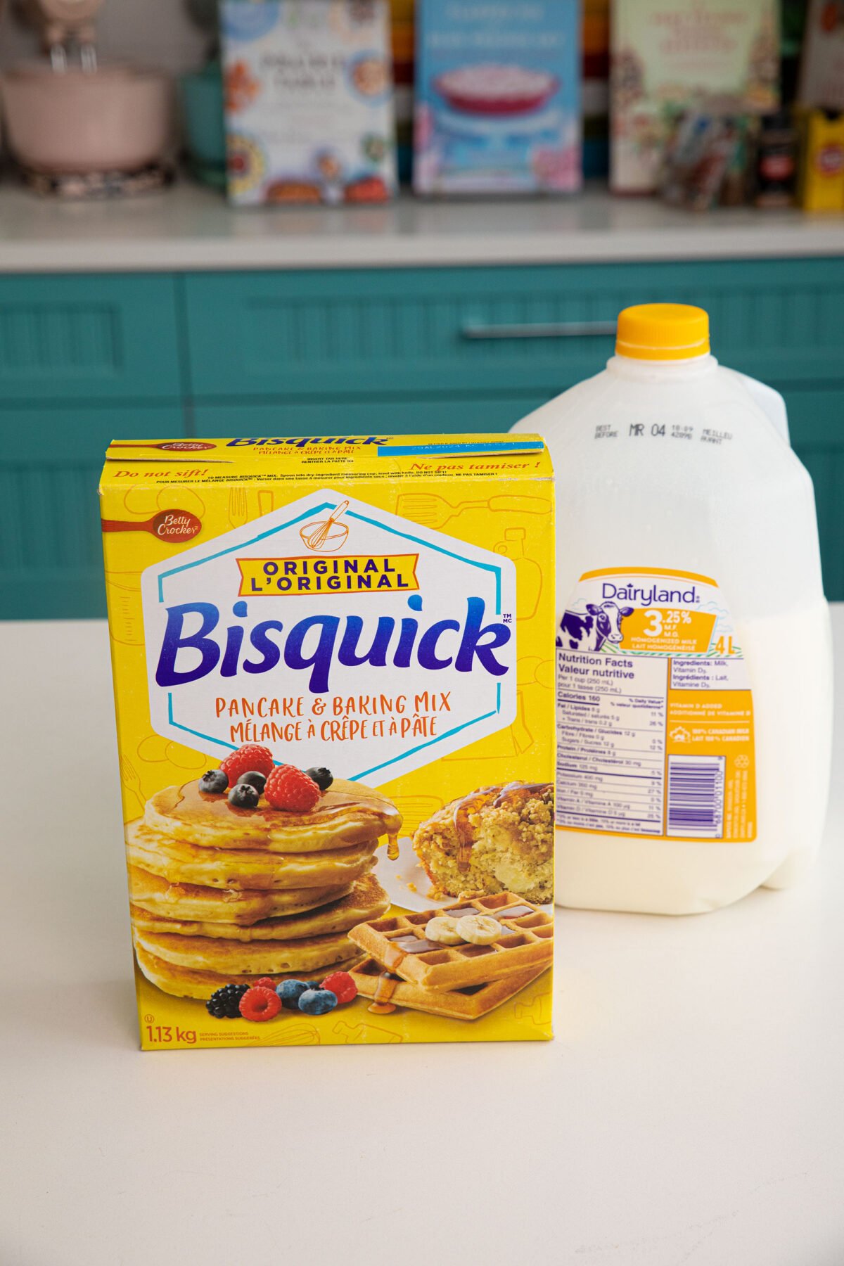 a box of Bisquick and a jug of milk