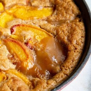 close up of Original Bisquick™ Peach Cobbler in a red large skillet