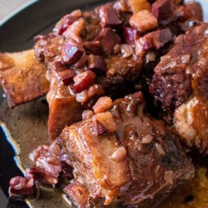 close up Braised Beef Short Ribs in a serving plate