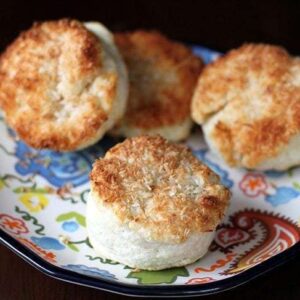 4 pieces of Honey & Coconut Biscuits in a colorful small plate