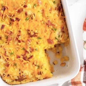 cornbread casserole with a corner cut out