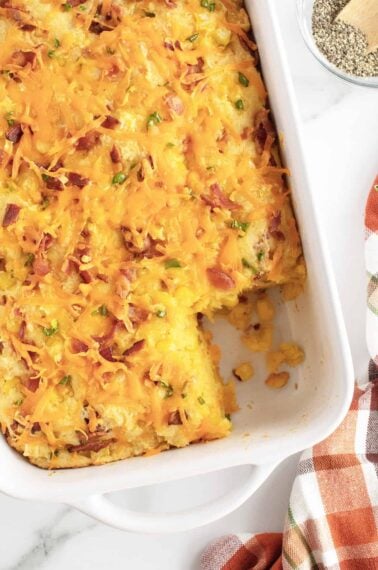 cornbread casserole with a corner cut out