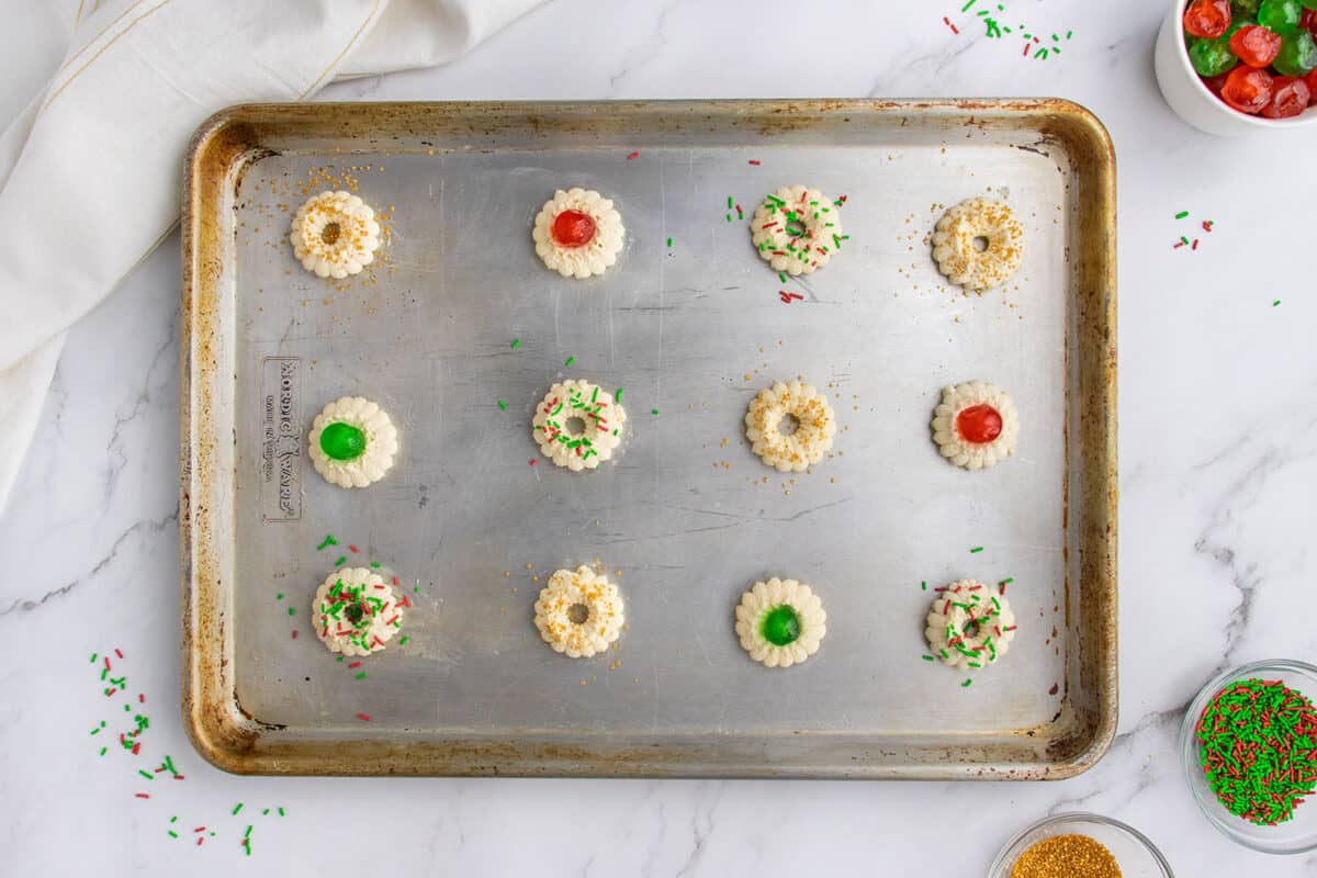 placing sprinkles on shortbread cookies