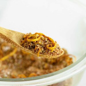 closeup on fish seasoning on a wooden spoon