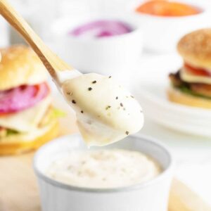 Garlic Aioli on a large wooden spoon