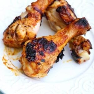 Cumin & Ginger Chicken Drumsticks in a white vintage plate