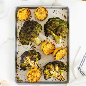 grilled broccoli on a sheet pan