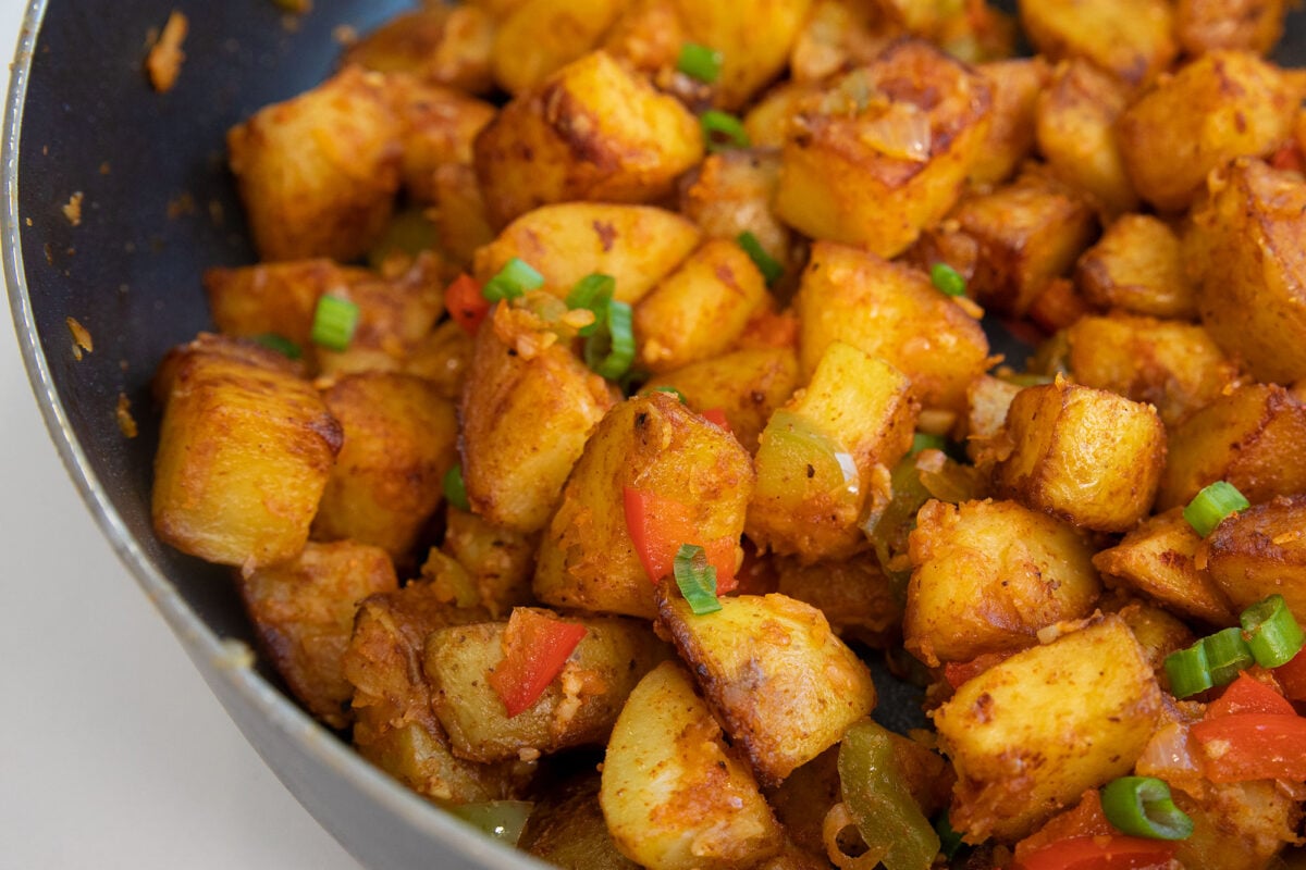 close-up of home fries in a pan