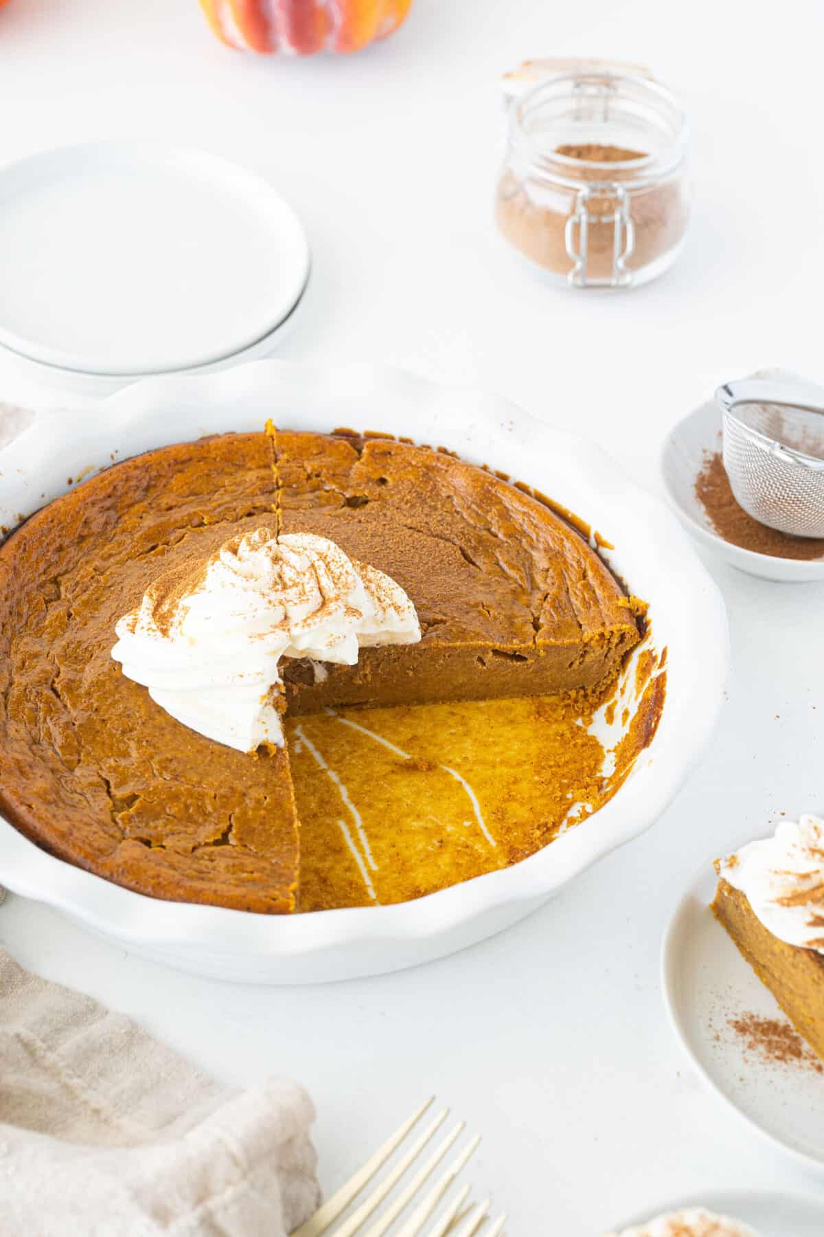 impossible pumpkin pie in a white pie plate