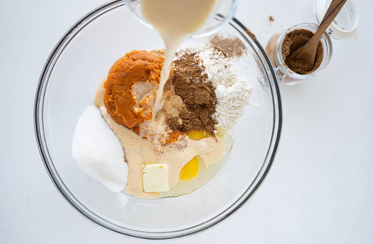 mixing impossible pumpkin pie ingredients in a bowl