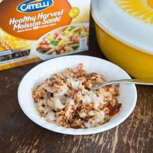 Macaroni Chop Suey in a White Bowl, Box of Catelli Macaroni and large yellow casserole dish at the back