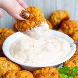 dipping a sausage ball in dipping sauce