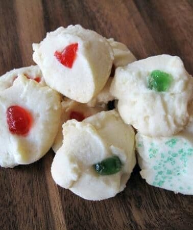 pieces of Whipped Shortbread in a wood background