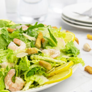 Shrimp Caesar Salad closeup on a plate