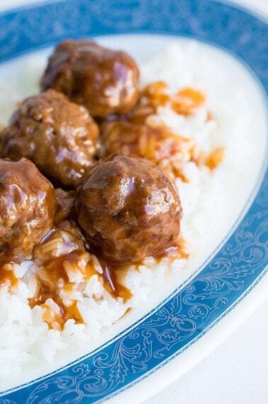 close up Sweet and Sour Meatballs in a plate with rice